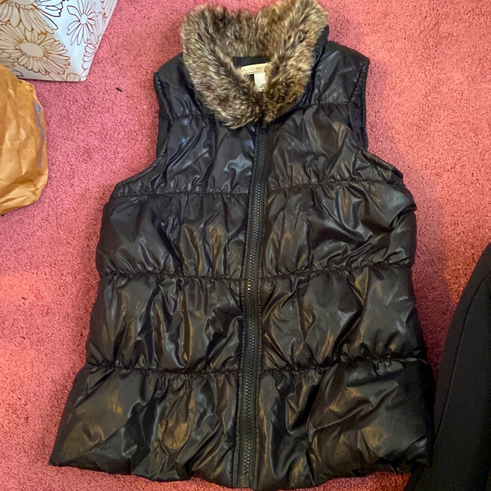Black and furry vest